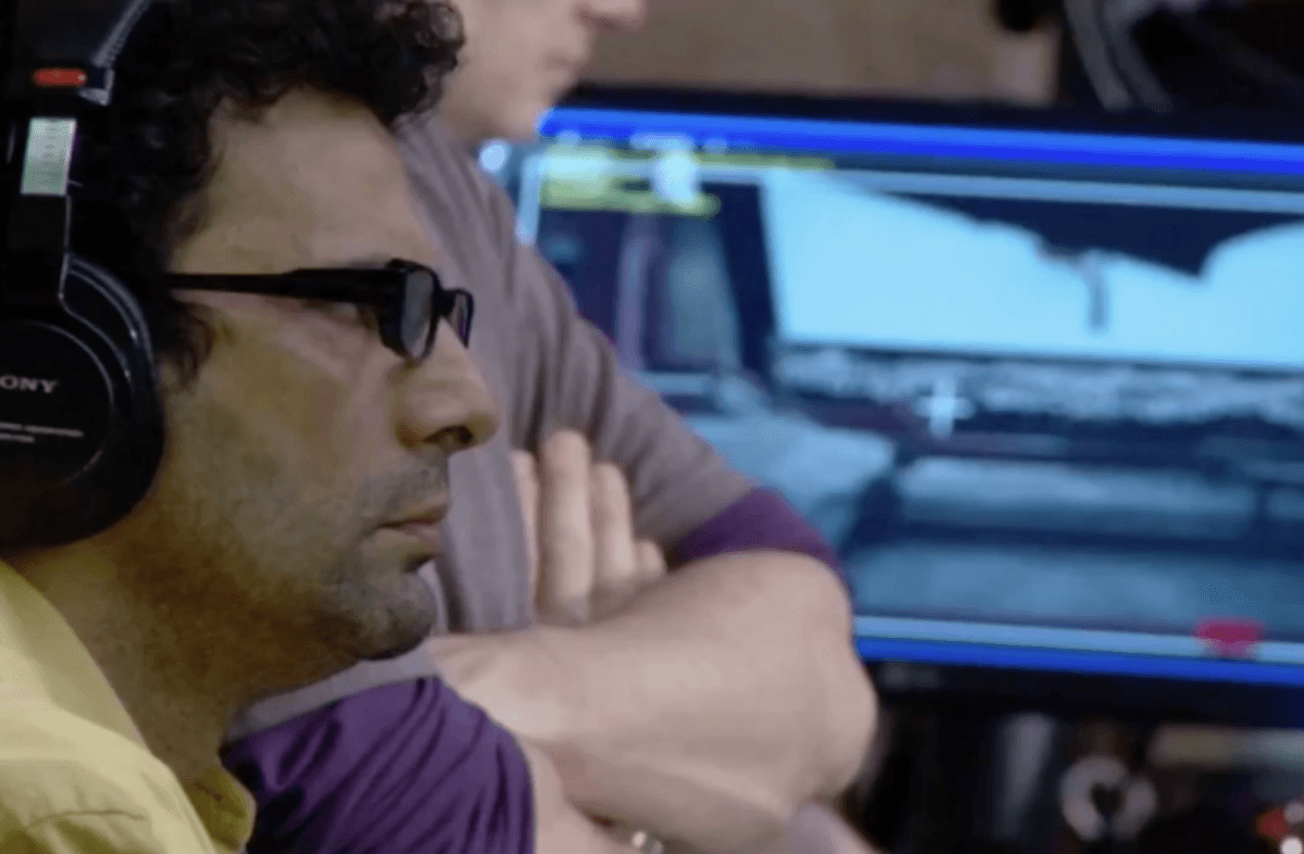 Director Tarsem Singh with monitor with Genie on-set previews in the background.
