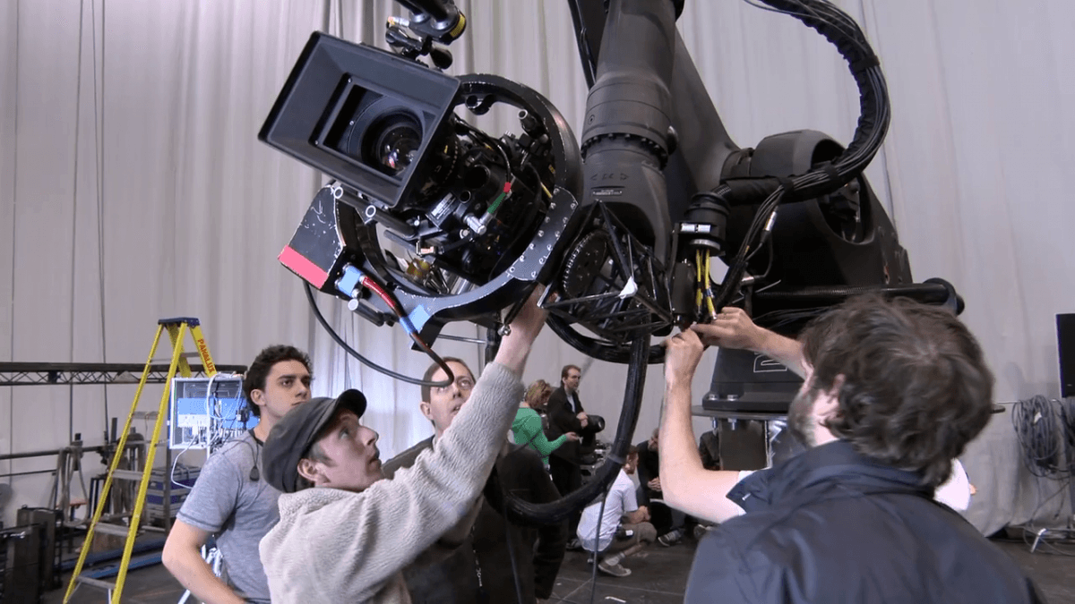 Technicians preparing shoot with Mo-Sys head attached to Bot'n'Dolly robot.