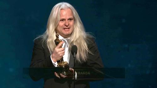 Claudio Miranda, with his Oscar for Best Achievement in Cinematography for Life of Pi (2012) at the